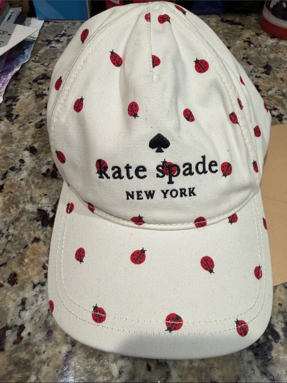 kate spade Cream Baseball Cap with Red Ladybug Print
